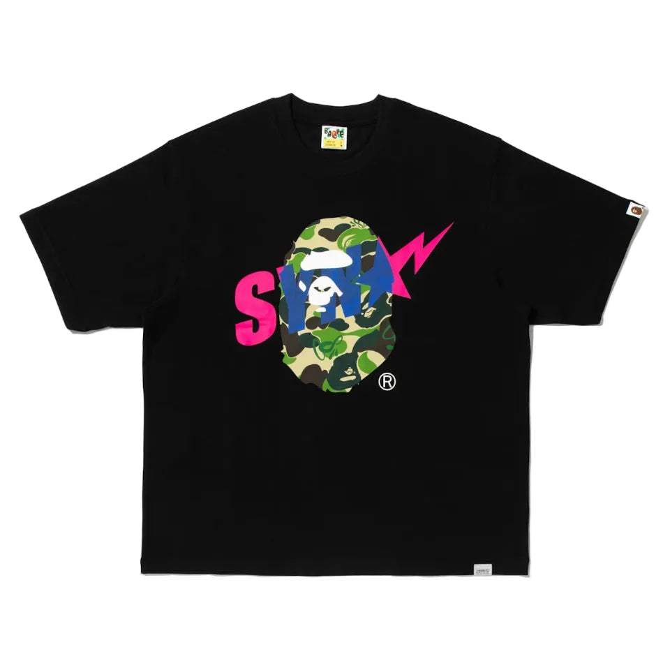 BAPE x Syna World graphic tee featuring a camouflage ape head logo